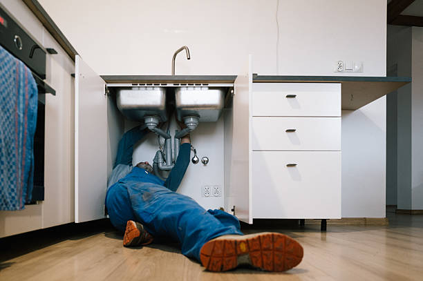 Professional Emergency Plumber technician working in Dickinson, ND